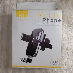 Air vent gravity phone holder